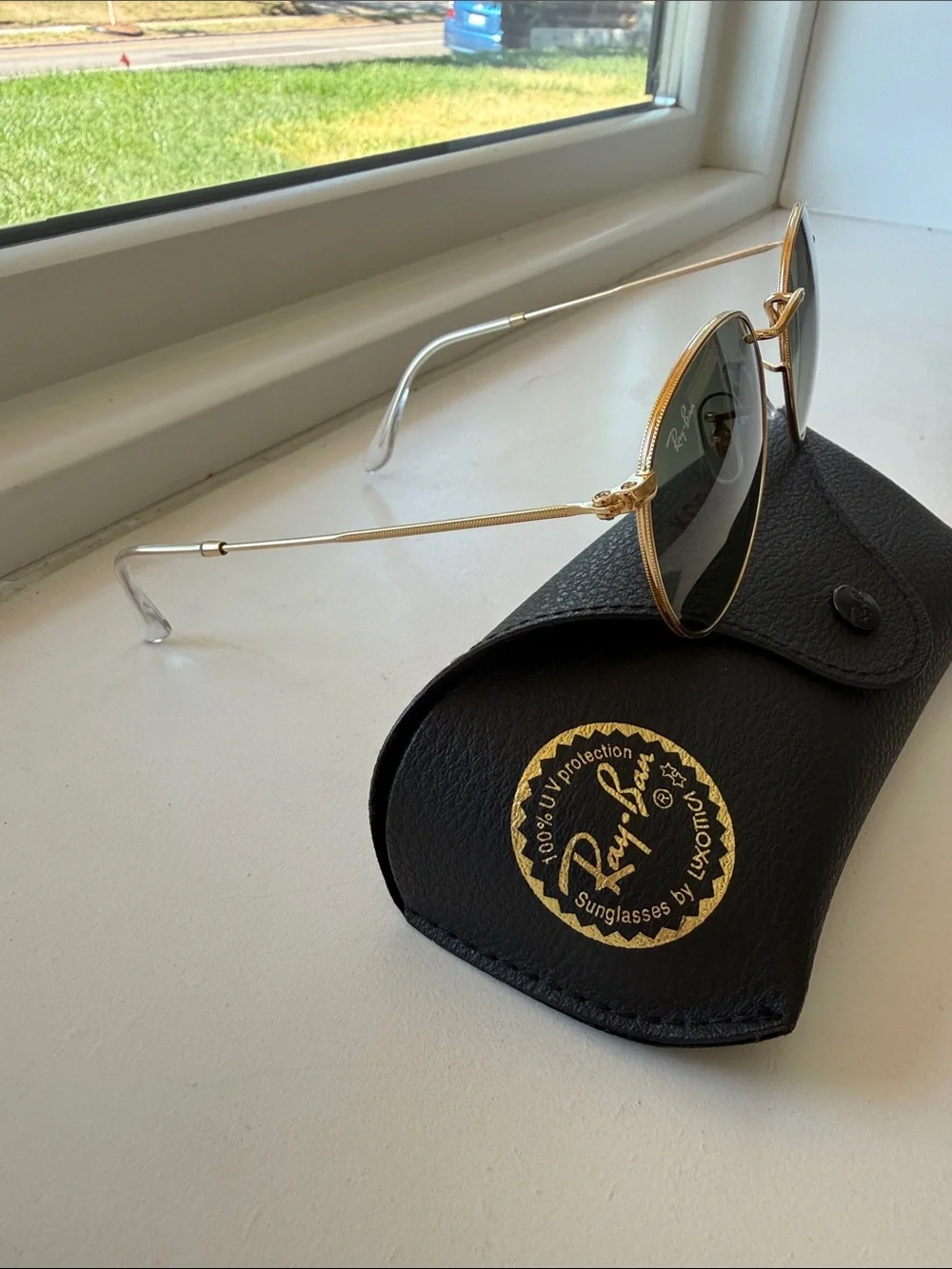 Ray-Ban Round Metal Frame Sunglasses with Green Lenses and Black Case